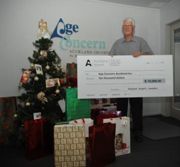 Grant Withers from Age Concern will use the $10,000 donated by Auckland Airport's travellers to buy Santa Saks for some of Auckland's older citizens.